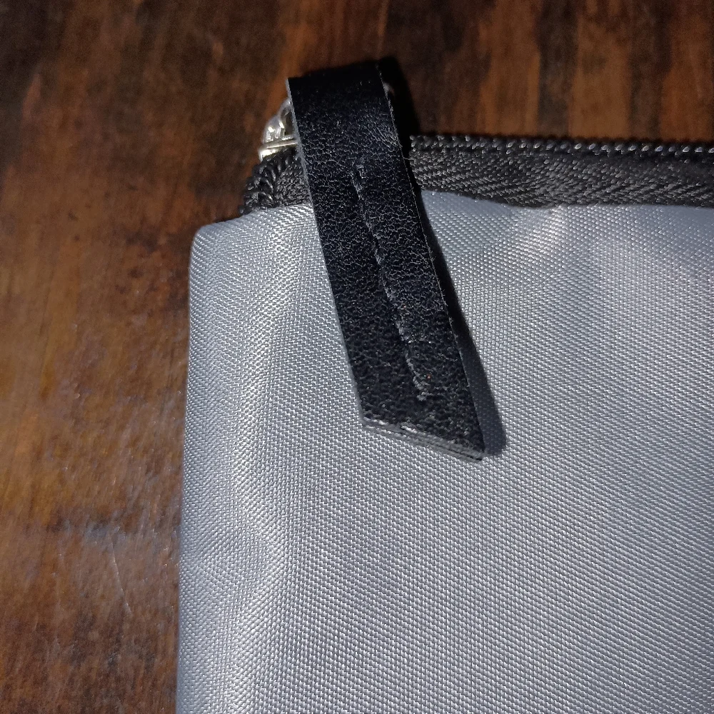 Tumi for Delta Gray Purple Lining Cosmetic Bag